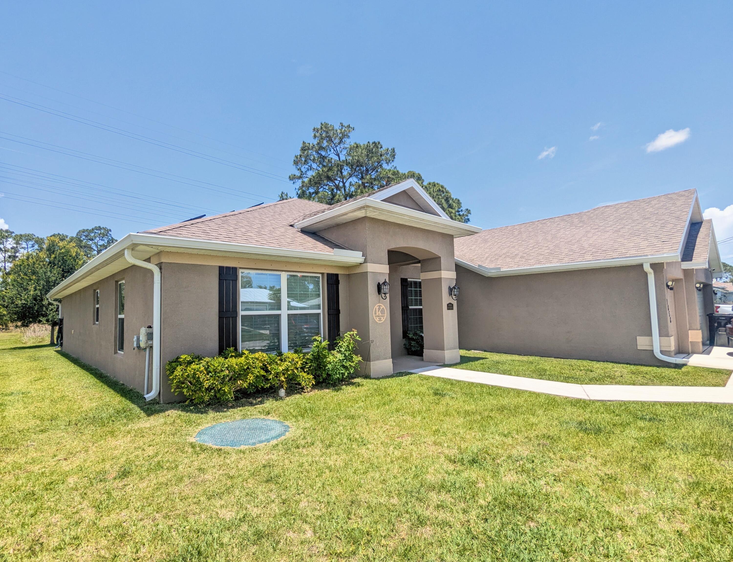 1858 SW Mackenzie Street, Port St. Lucie, FL 34953