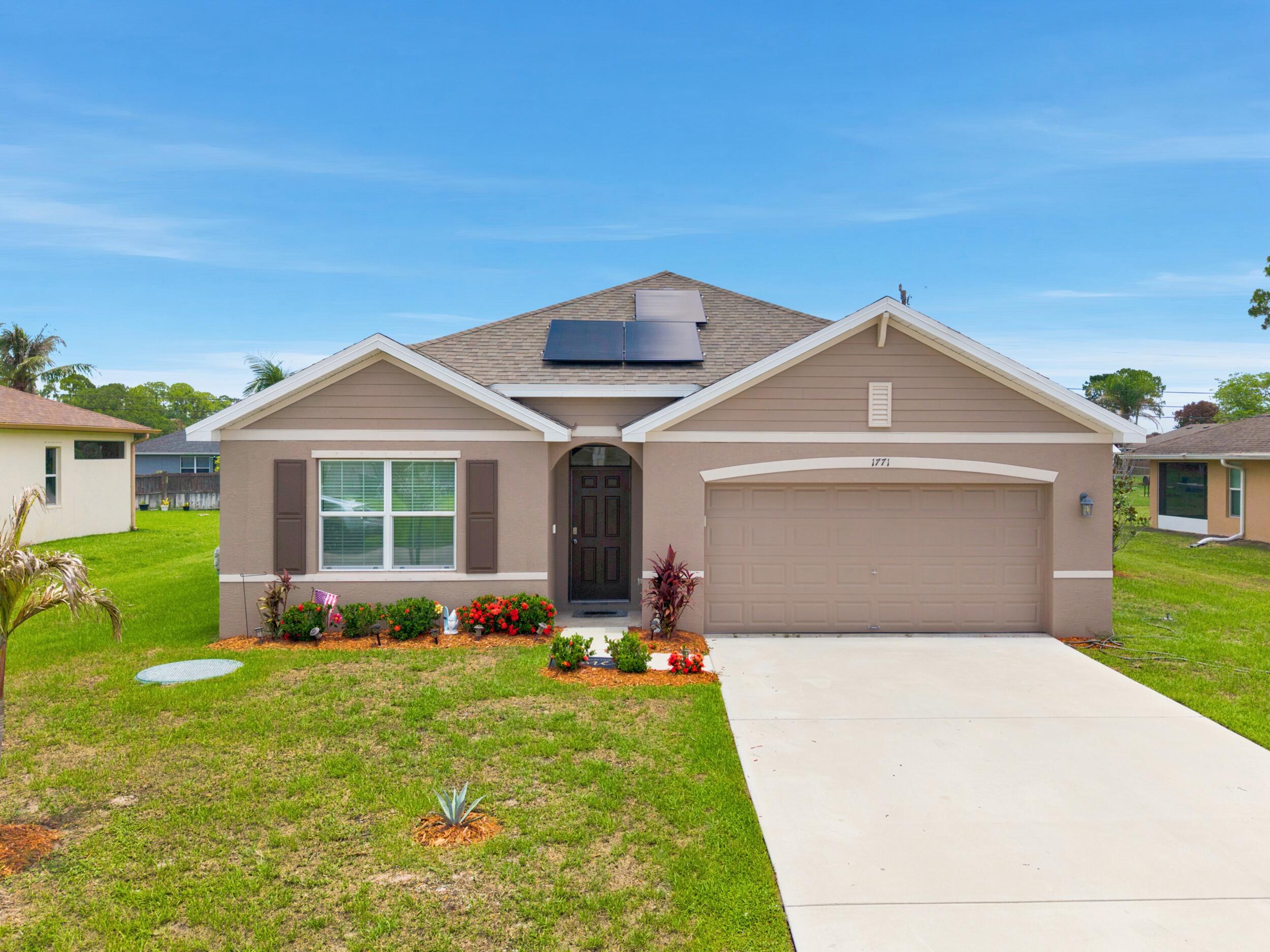 1771 SW Lofgren Avenue, Port St. Lucie, FL 34953